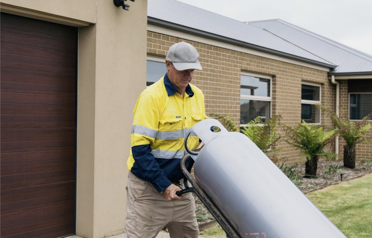 Delivery person with gas cylinder